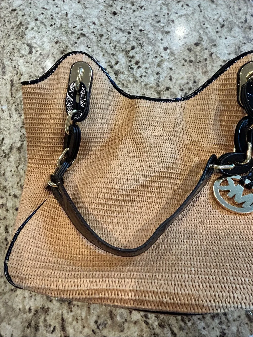 Michael Kors Straw Shoulder Purse in Tan with Black Chain handles. Nice